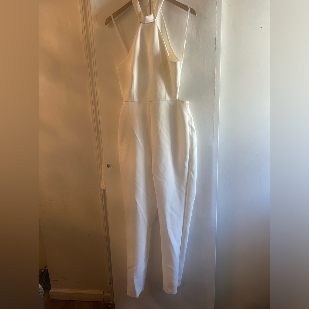 White jump suit